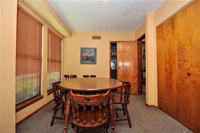 view of carpeted dining room