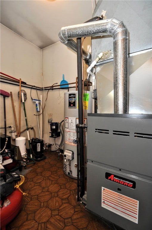 utility room with water heater