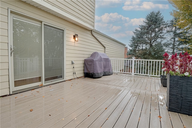 wooden deck with area for grilling