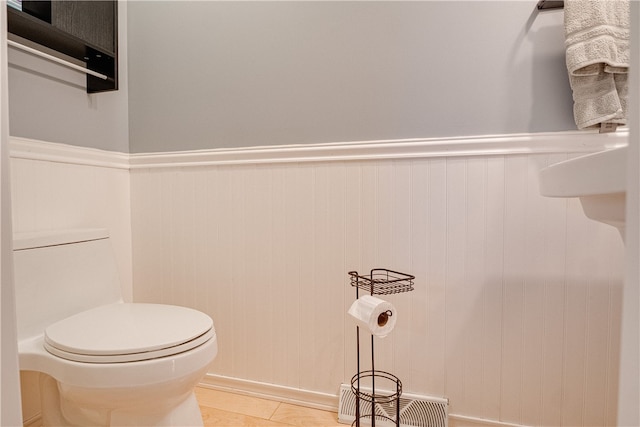 bathroom with tile patterned floors and toilet