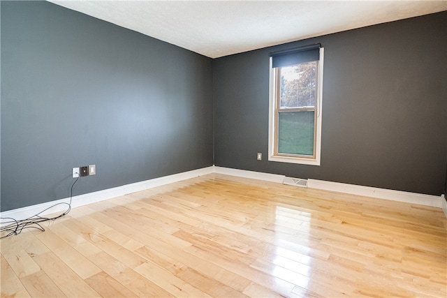 empty room featuring light hardwood / wood-style flooring