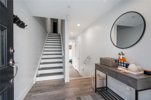 foyer featuring dark hardwood / wood-style floors