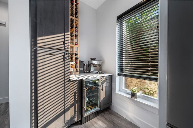 interior space featuring wine cooler and hardwood / wood-style floors