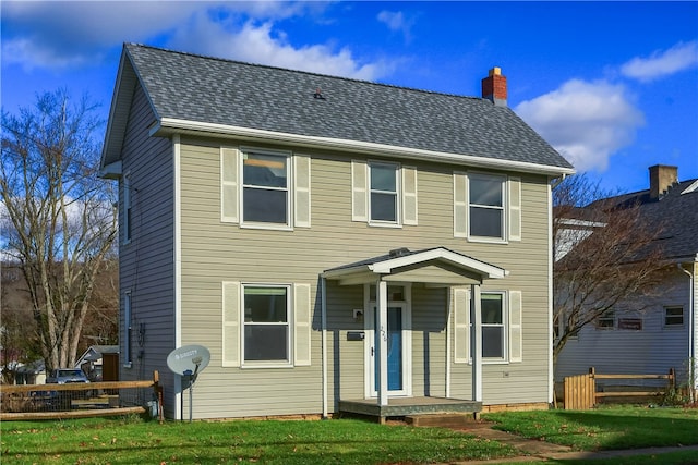 view of front of home with a front yard