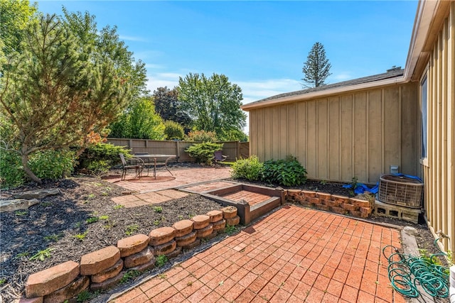 view of patio with cooling unit