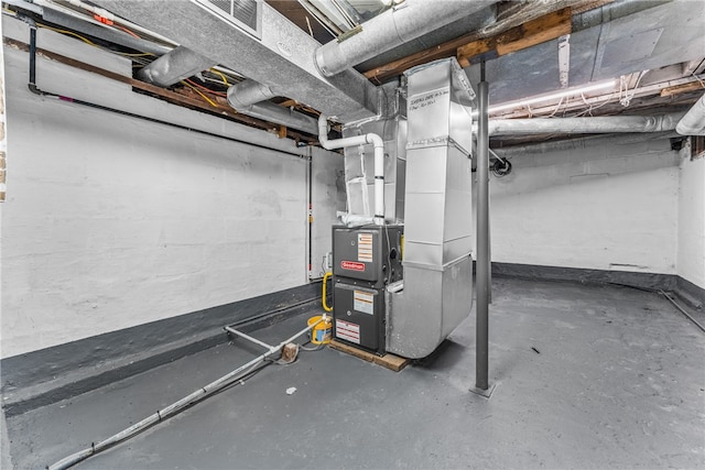 basement featuring heating unit