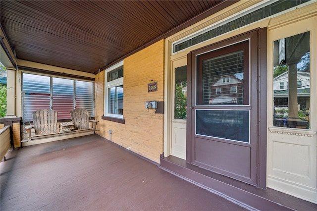 entrance to property with covered porch