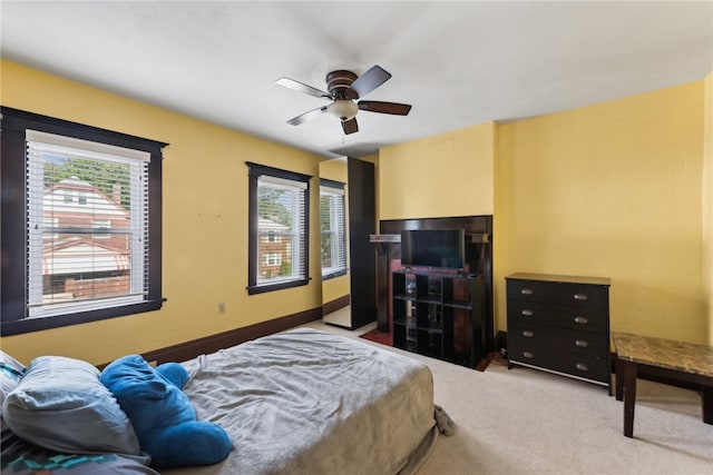 bedroom featuring carpet and ceiling fan