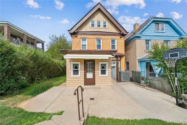 view of front of property with a balcony