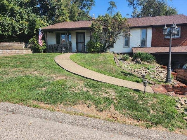 ranch-style house with a front yard