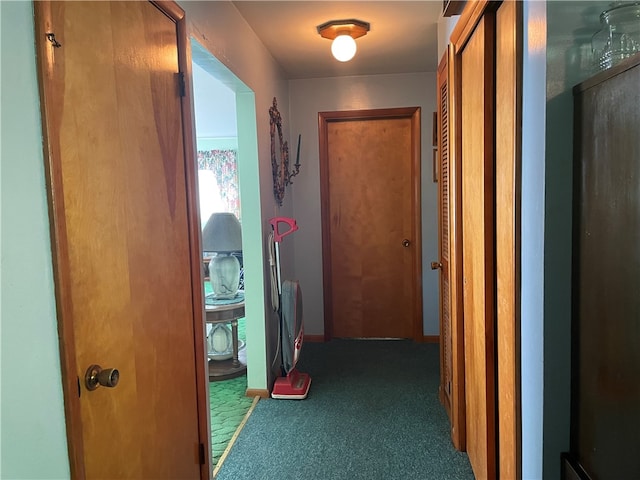 corridor with light colored carpet