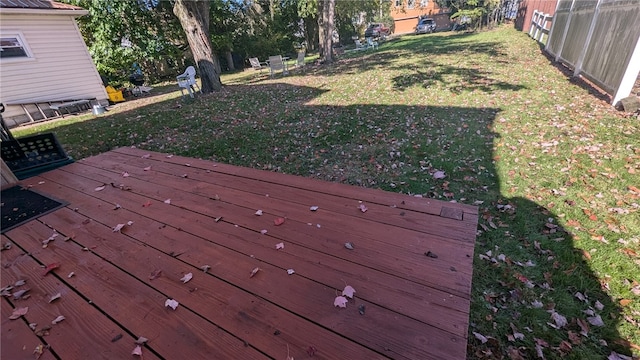 deck featuring a lawn