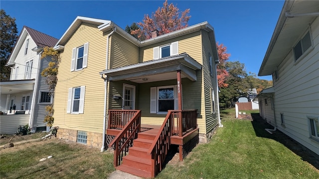 view of front of home with a front lawn