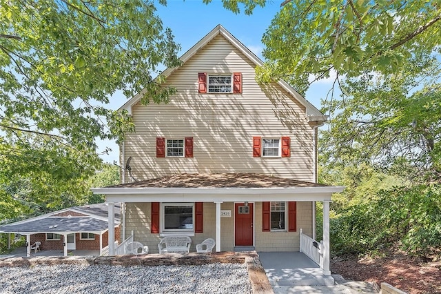 view of property with a porch