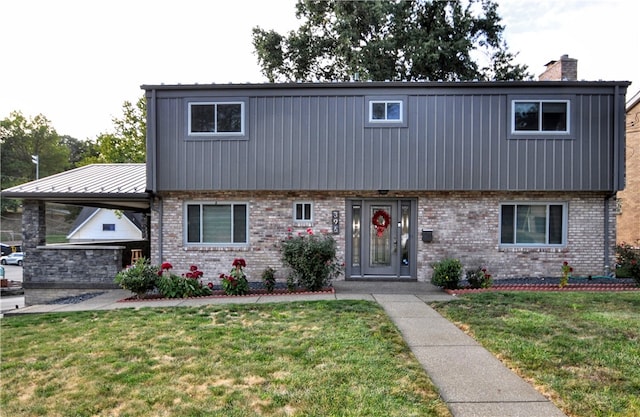 view of front of property with a front lawn and exterior kitchen