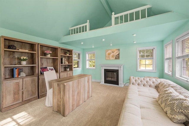 carpeted living room with high vaulted ceiling, a wealth of natural light, and beam ceiling