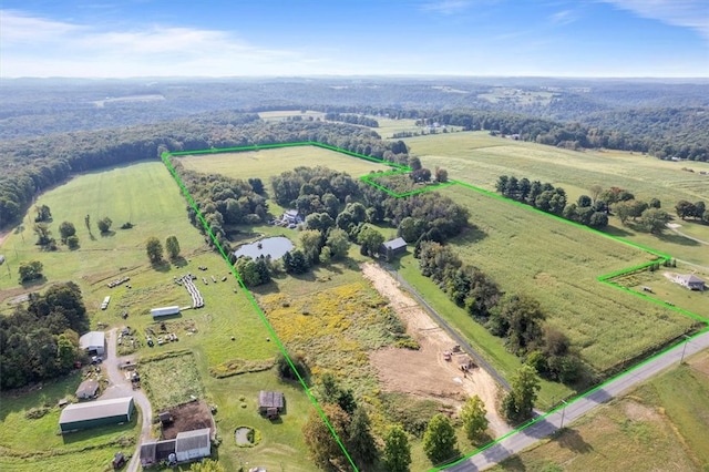 birds eye view of property featuring a rural view