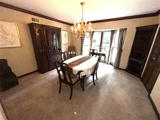 carpeted dining area with crown molding and a chandelier