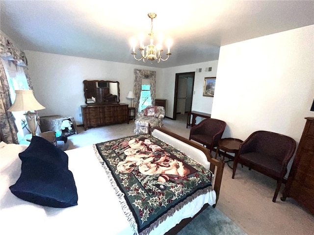 bedroom featuring an inviting chandelier and carpet flooring