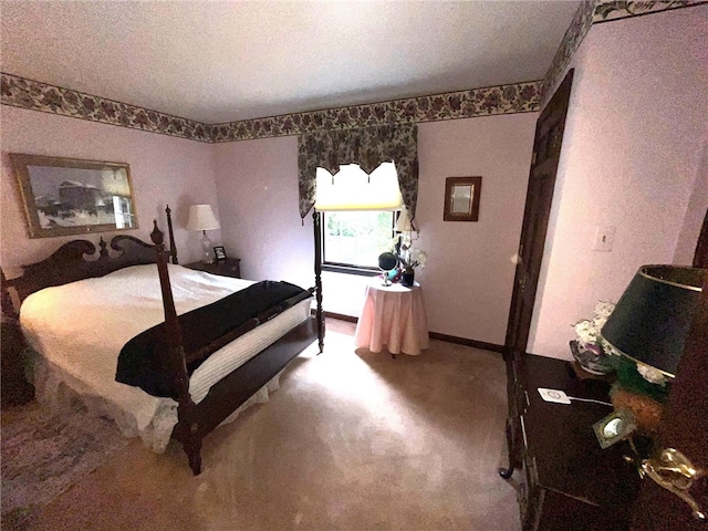 carpeted bedroom with a textured ceiling