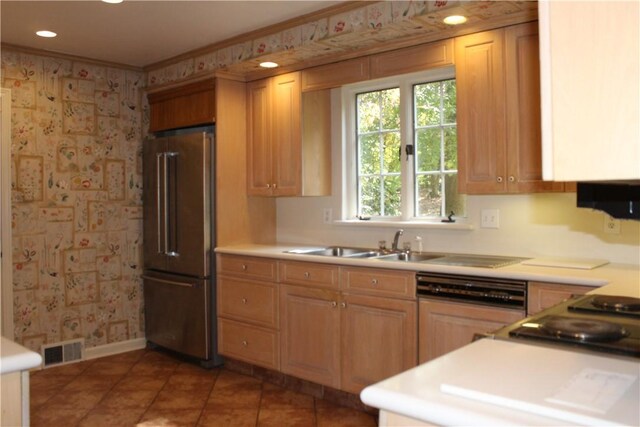 kitchen with dishwashing machine, crown molding, tile patterned floors, and high end fridge