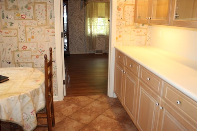 kitchen with hardwood / wood-style floors