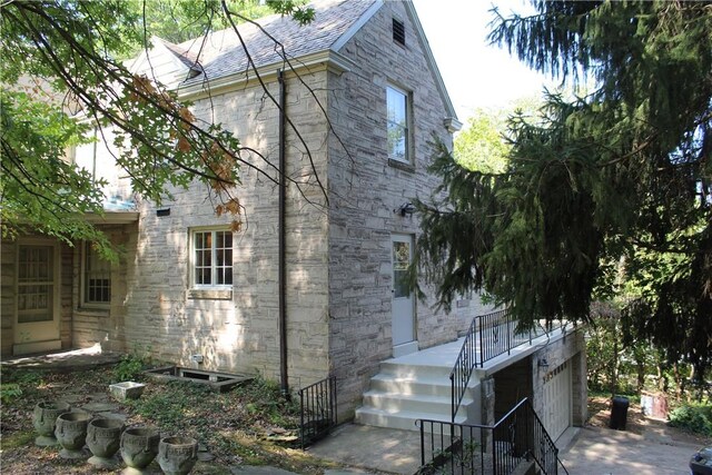 view of home's exterior featuring a garage