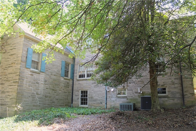 view of property exterior featuring central AC unit