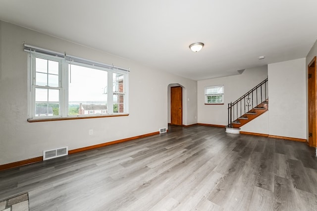 interior space featuring hardwood / wood-style floors and a healthy amount of sunlight