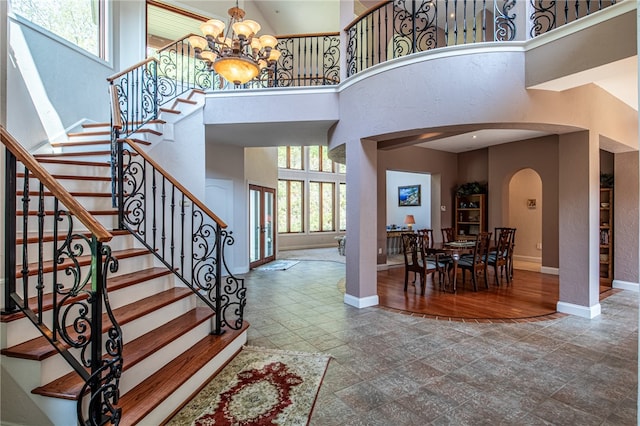 entrance foyer with a high ceiling and a wealth of natural light