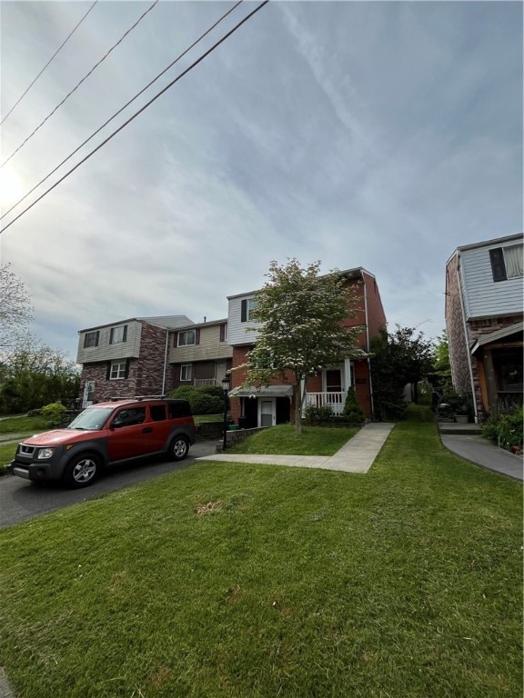 view of front of home with a front yard