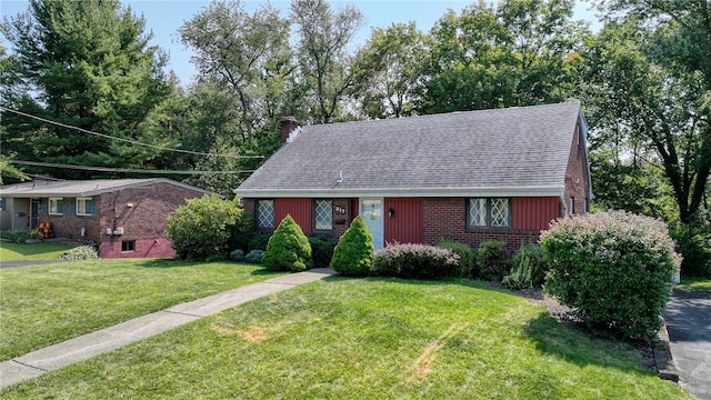 view of front of property with a front lawn