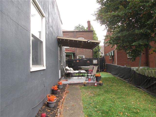 view of yard featuring a pergola and a patio