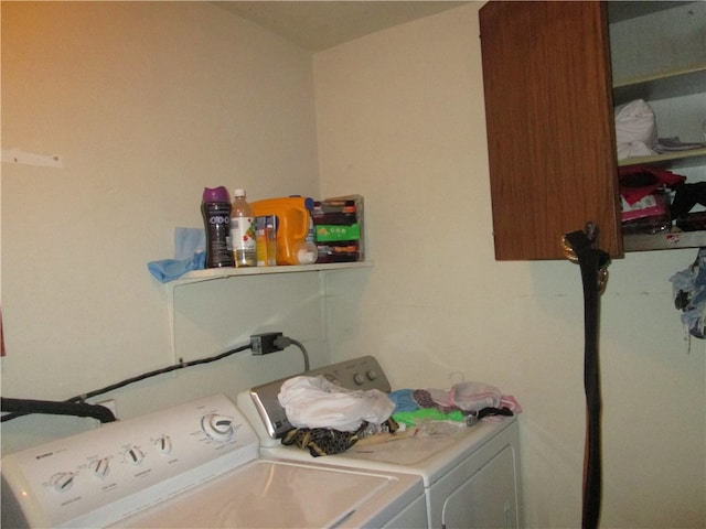 washroom with washer and clothes dryer