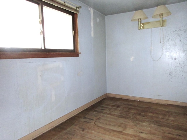 spare room featuring hardwood / wood-style flooring