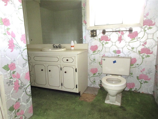 bathroom with vanity and toilet