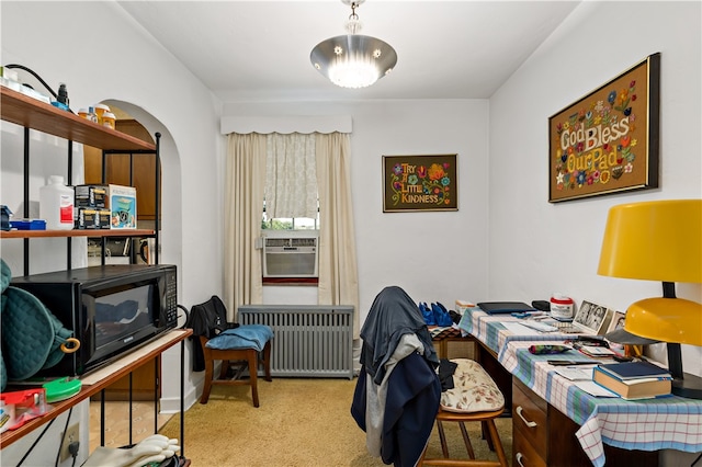 office featuring cooling unit, radiator, and light colored carpet