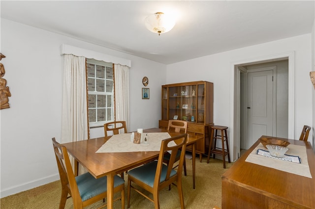 dining room with carpet floors