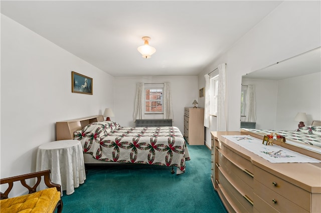 bedroom featuring dark carpet