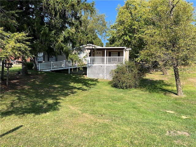 view of yard featuring a deck