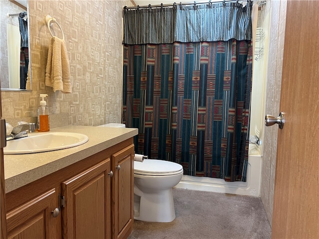 full bathroom with shower / bath combo, vanity, and toilet