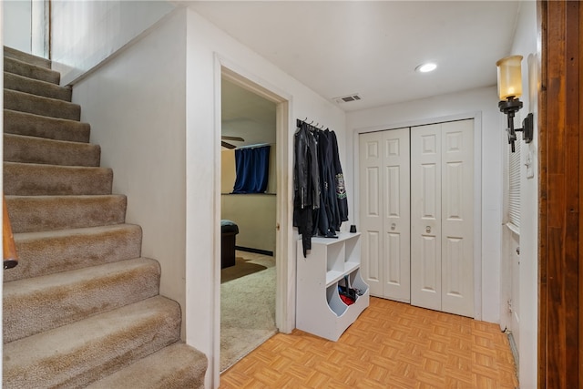 entrance foyer featuring light parquet floors