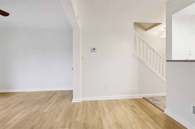 interior space featuring ceiling fan and light wood-type flooring