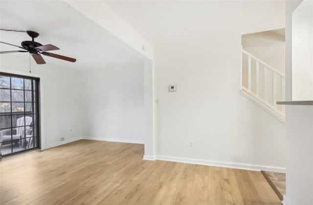 unfurnished living room with light hardwood / wood-style floors and ceiling fan