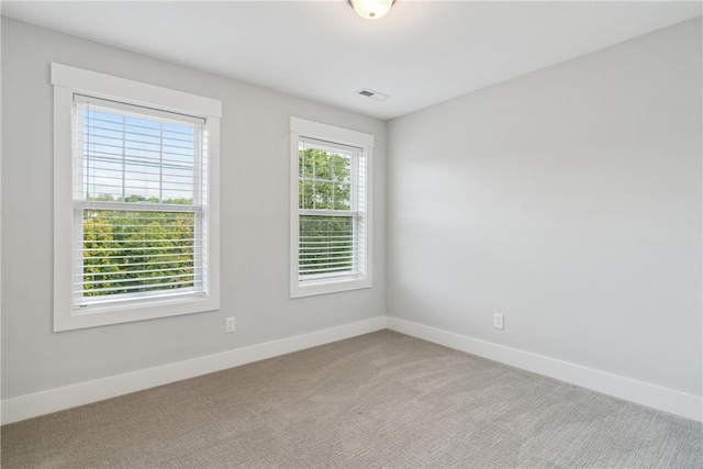 view of carpeted spare room