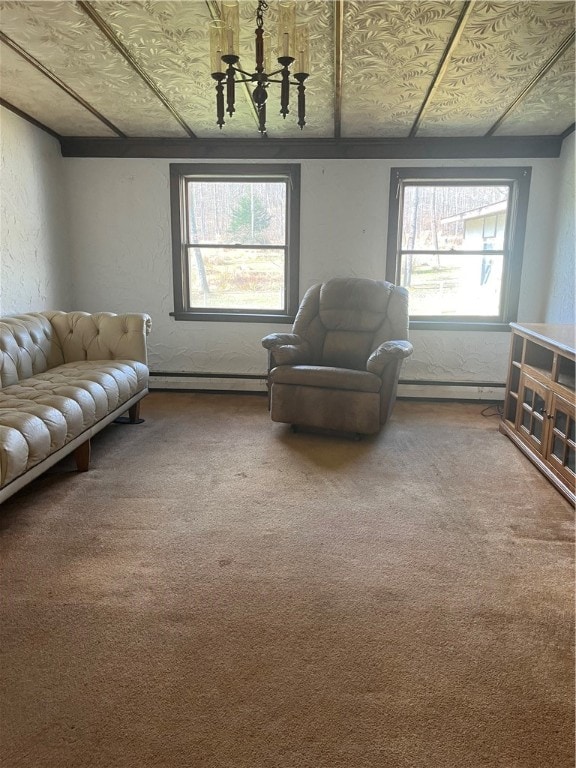 living area with a baseboard radiator and carpet