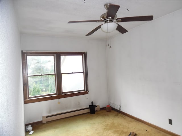 unfurnished room with carpet floors, a baseboard heating unit, and ceiling fan