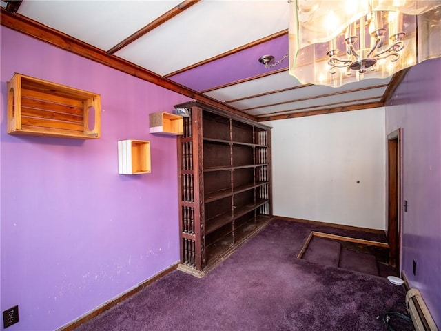 basement with dark colored carpet, a chandelier, and baseboard heating