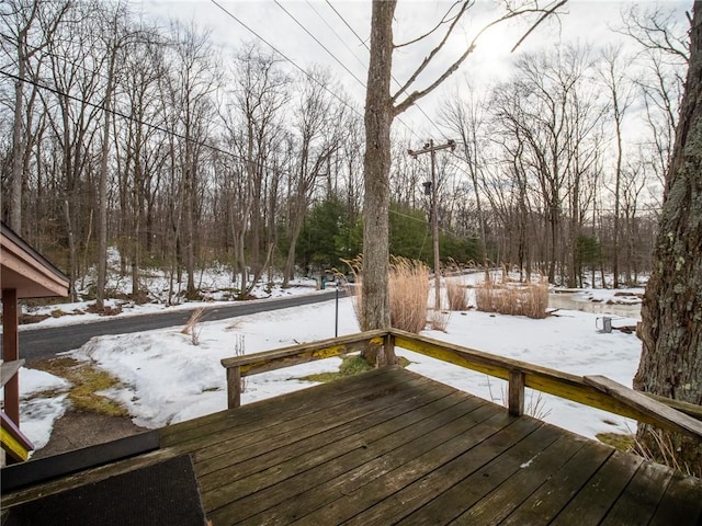 view of snow covered deck