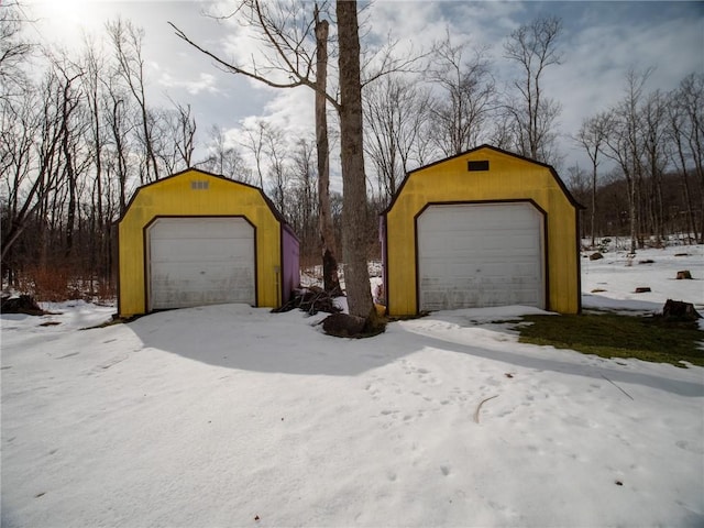 view of snow covered garage